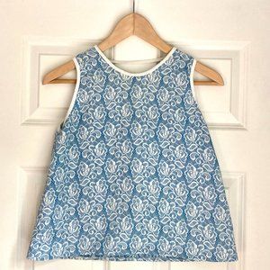 Short sleeveless girls top, white and blue print, size 12